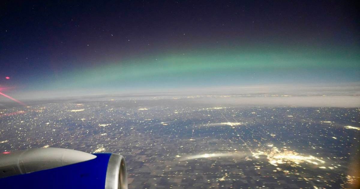 Northern Lights seen from a flight to Chicago. (Cover Image Source: X | @RyanJFrench)