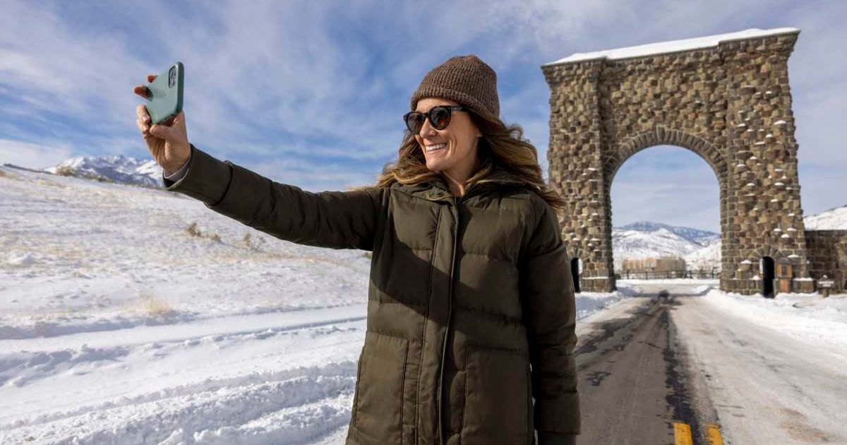 Visitor clicking selfie in Yellowstone National Park during winter (Representative Cover Image Source: Getty Images | Jordan Siemens)