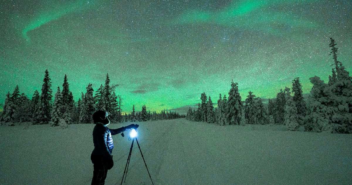 A man photographing the Northern Lights. (Representative Cover Image Source: Getty Images | Roberto Moiola | Sysaworld) 