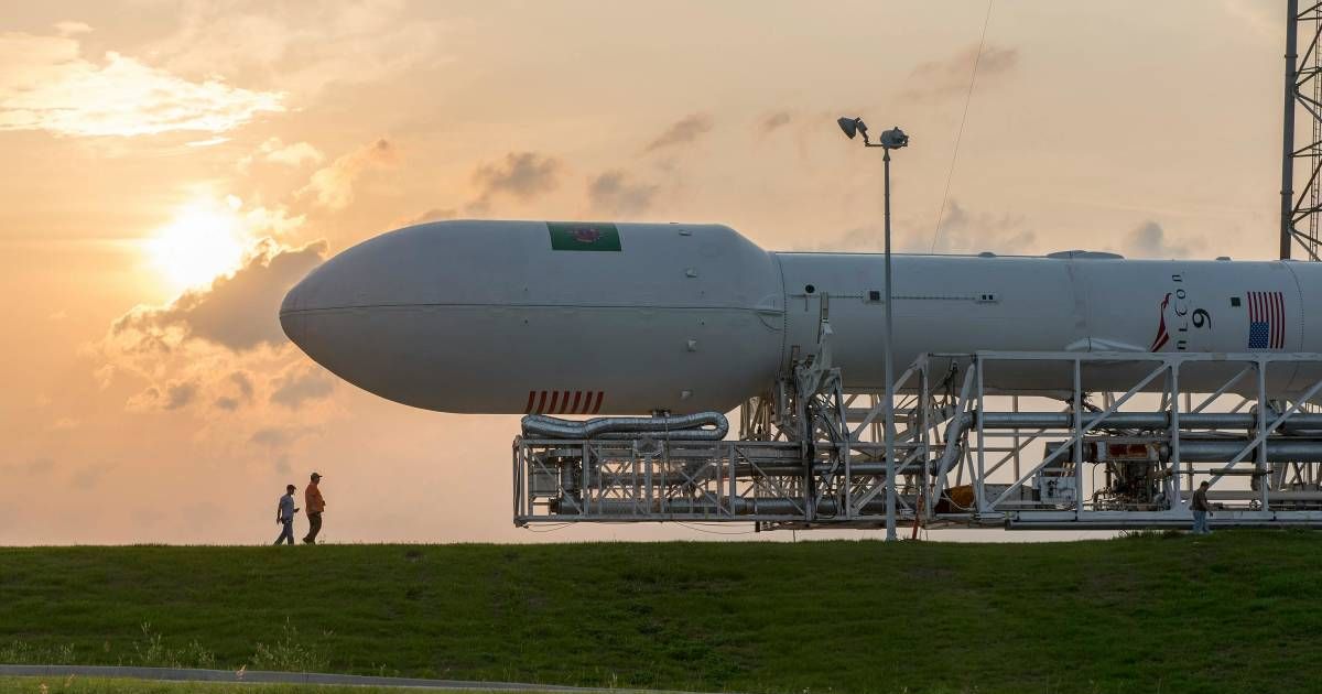 Two people walk past a spacecraft. (Representative Cover Image Source: Pexels | SpaceX)