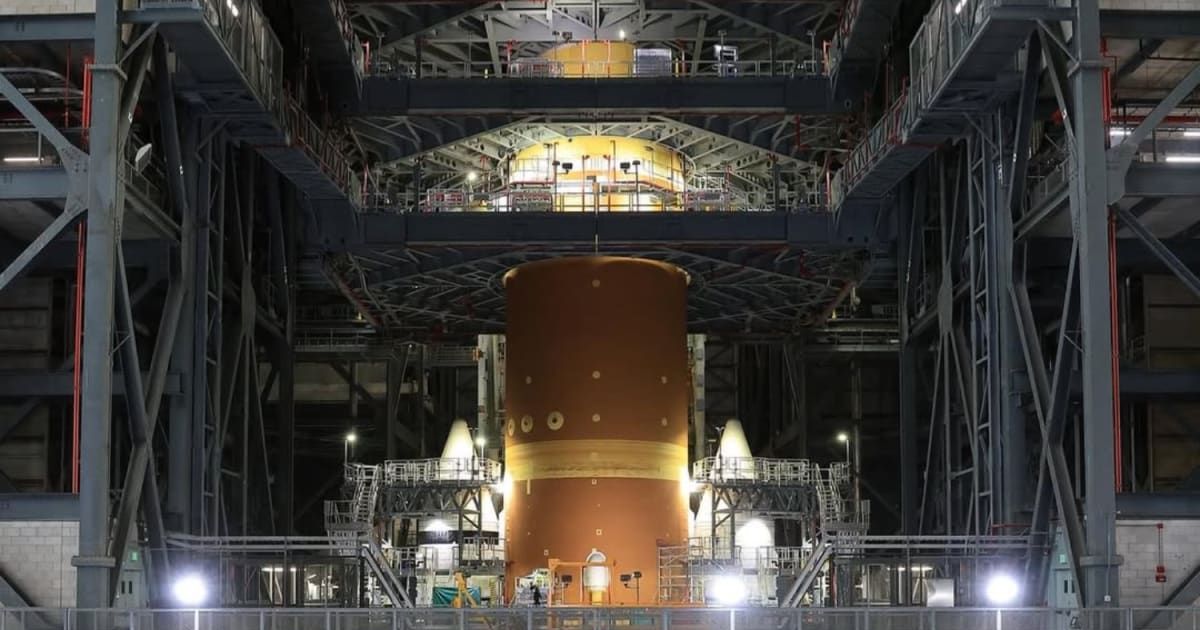 NASA’s Artemis II Orion spacecraft with its launch abort system, is stacked atop the agency’s SLS (Space Launch System) rocket at NASA’s Kennedy Space Center. (Image Source: Instagram | @nasaartemis)