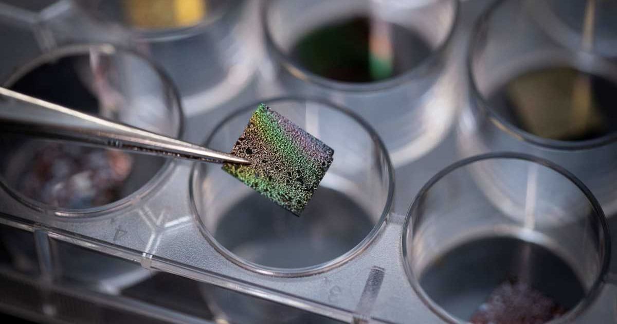 Cosmic dust analogue on a chip. The cocktail of chemicals was collected on a microchip. (Cover Image Source: Fiona Wolf / The University of Sydney)