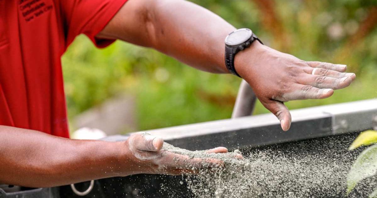 Spreading Silicate on Field (Image Source: Cornell Chronicle)